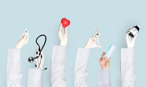 Doctors hands holding medical care objects Doctors hands holding medical care objects